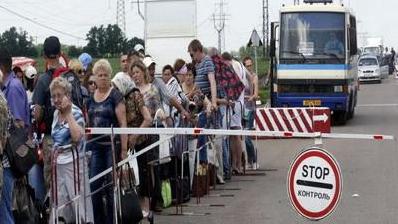 Стаття Паспорт на переоформлении: как пересечь линию разграничения? Утренний город. Донецьк