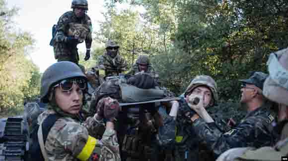 Стаття Доклад ООН: Украинских военных под Иловайском убивали русские военные Ранкове місто. Донбас