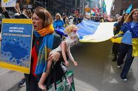 Стаття Спасите детей Украины! В городах мира прошли массовые марши (фото) Ранкове місто. Донбас